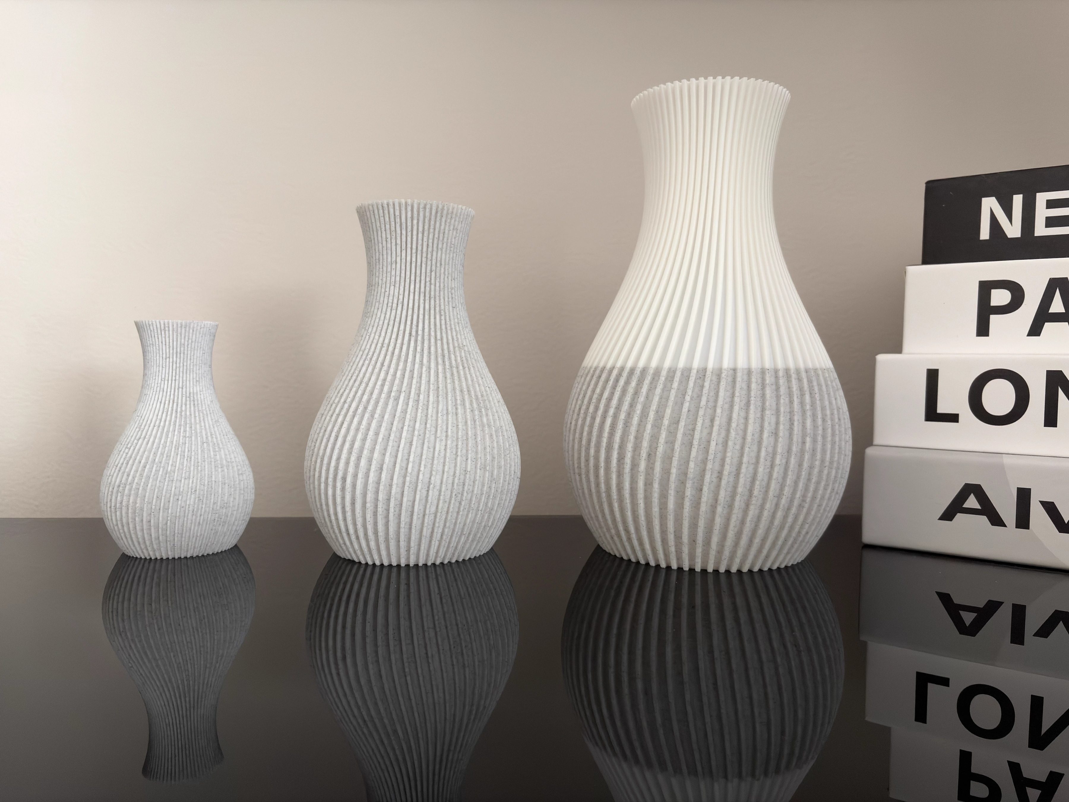 Pleat set from small to large, with the large vessel shown in a custom white-and-marble split finish